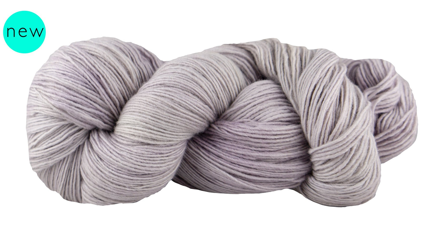 Fingering weight merino and silk yarn by Manos del Uruguay - Fino in pale variegated lavender purple.